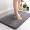 Anti Rutsch Badematte grau, weicher Flor, für sicheren Stand im Badezimmer.