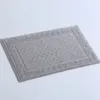 Anti Rutsch Badematte Baumwolle grau mit griechischem Muster, ideal für Badezimmer.