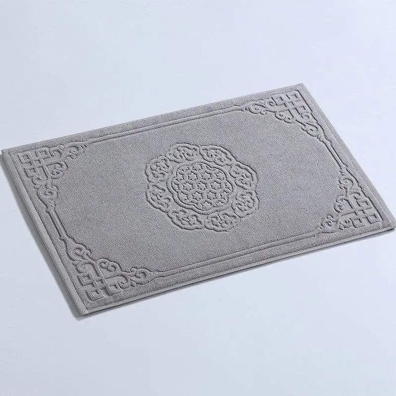Badematte Baumwolle grau mit filigranem Ornamentmuster, ideal für Badezimmer.