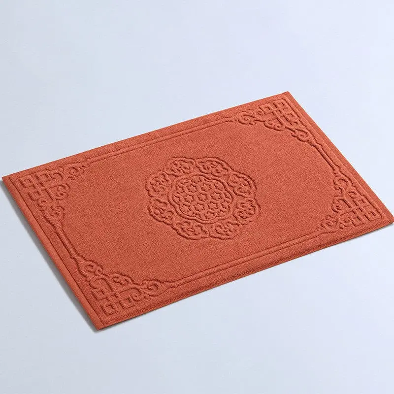 Badematte Baumwolle orange mit filigranem Muster, ideal für Badezimmer.