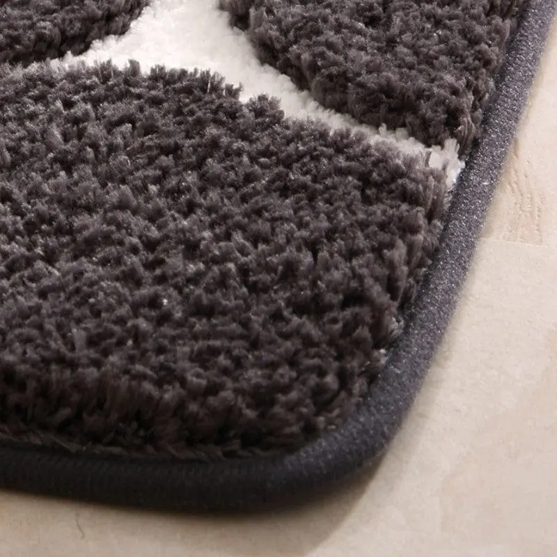 Badematte Memory Foam grau-weiß, weicher Flor, ideal für Badezimmer.