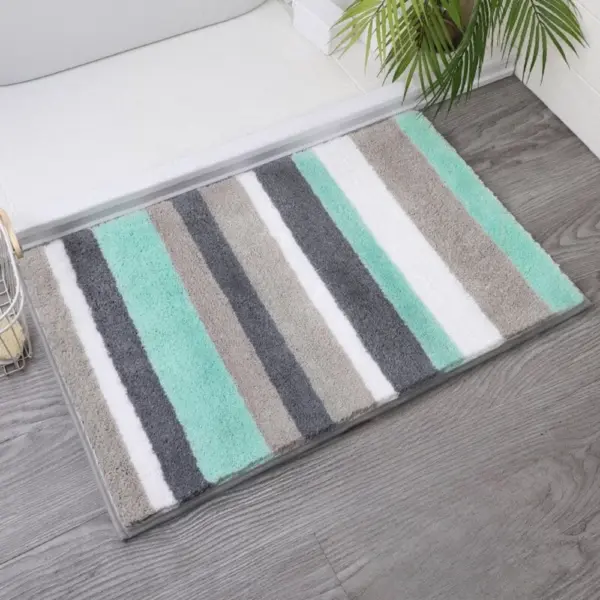 Runde Badematte mit Streifenmuster in Grau, Mint und Weiß für Badezimmer.