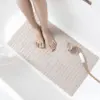 Badewanneneinlage mit Mosaikmuster, weich und rutschfest, ideal für Badezimmer.