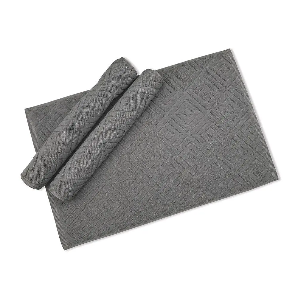 Grauer Badezimmerteppich aus 100 Baumwolle mit geometrischem Muster, ideal für Bad und Dusche.