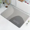 Modernes Badezimmerteppich Design mit Motiv 'You Must Believe In Yourself' in Grau und Weiß, ideal für stilvolles Badezimmer.