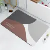 Modernes Badezimmerteppich Design mit Motiv 'You Must Believe In Yourself' in Grau, Braun und Weiß.