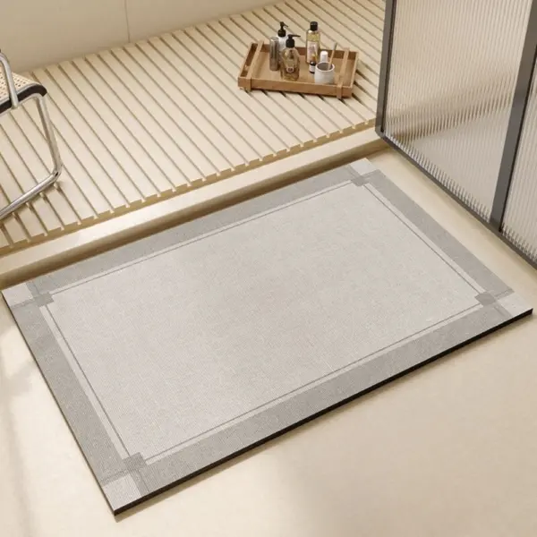 Badezimmerteppich grün mit grauem Rand, modernes Design für Badezimmer.
