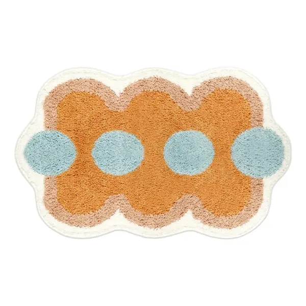 Orange Badezimmerteppich mit blauen Punkten und welligem Rand, modernes Design für Badezimmer.