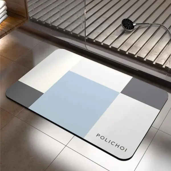 Rutschfester Badezimmerteppich mit geometrischem Muster in Blau und Grau, ideal für Nassräume.