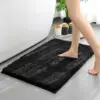 Schwarzer Waschbarer Badezimmerteppich mit flauschigem Hochflor, ideal für Badematte im Badezimmer.