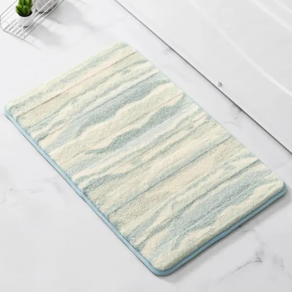 Badteppich Bader mit blau-cremefarbenem Marmor-Muster, weiches Material, ideal für Badezimmer.
