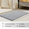 Badteppich Boho in Grau mit Fransen, rutschfest, wasserfest und saugfähig fürs Badezimmer.