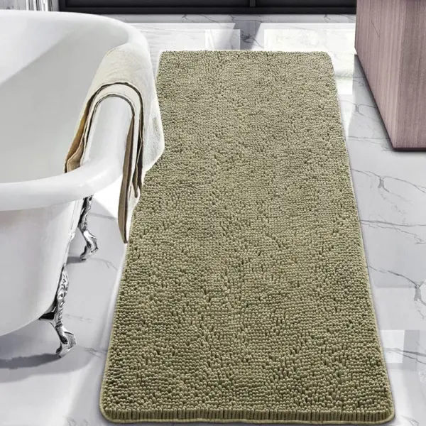 Dunkelgrüner Badteppich mit Chenille-Struktur, ideal für Badezimmer und Dusche.