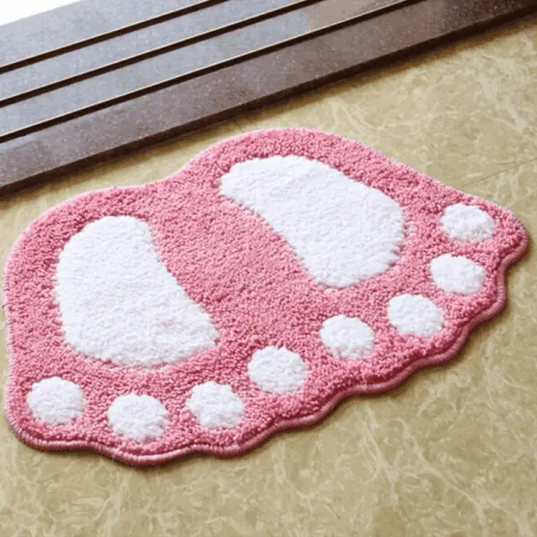 Pink Fussform Badteppich mit weißen Zehen, weiches Badezimmer-Textil.