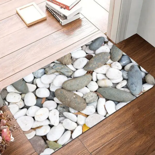 Badteppich mit Steinmuster grau, ideal für Badezimmer und Eingangsbereich.