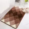 Badteppich grau mit geometrischem Muster, weicher Hochflor, ideal für Badezimmer.