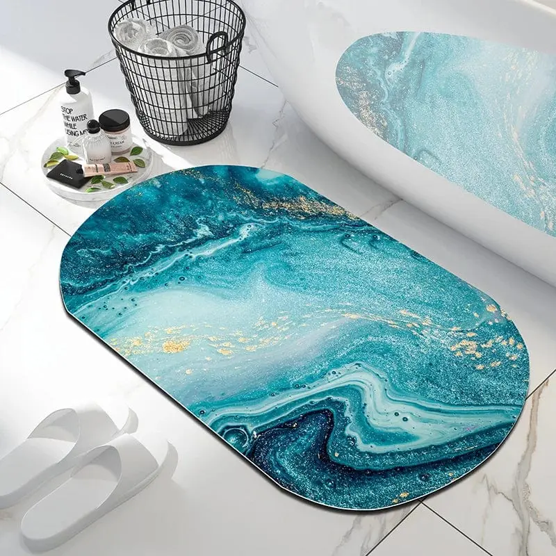 Badteppich Marmor Muster in Blau und Gold, oval, für Badezimmer.