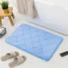 Blauer Badteppich Mikrofaser Memory-Schaum mit Quastenmuster, ideal für Badezimmer.