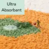 Orange Badteppich mit grünem Absorptionsbereich, Wasser wird ultra absorbent aufgenommen.