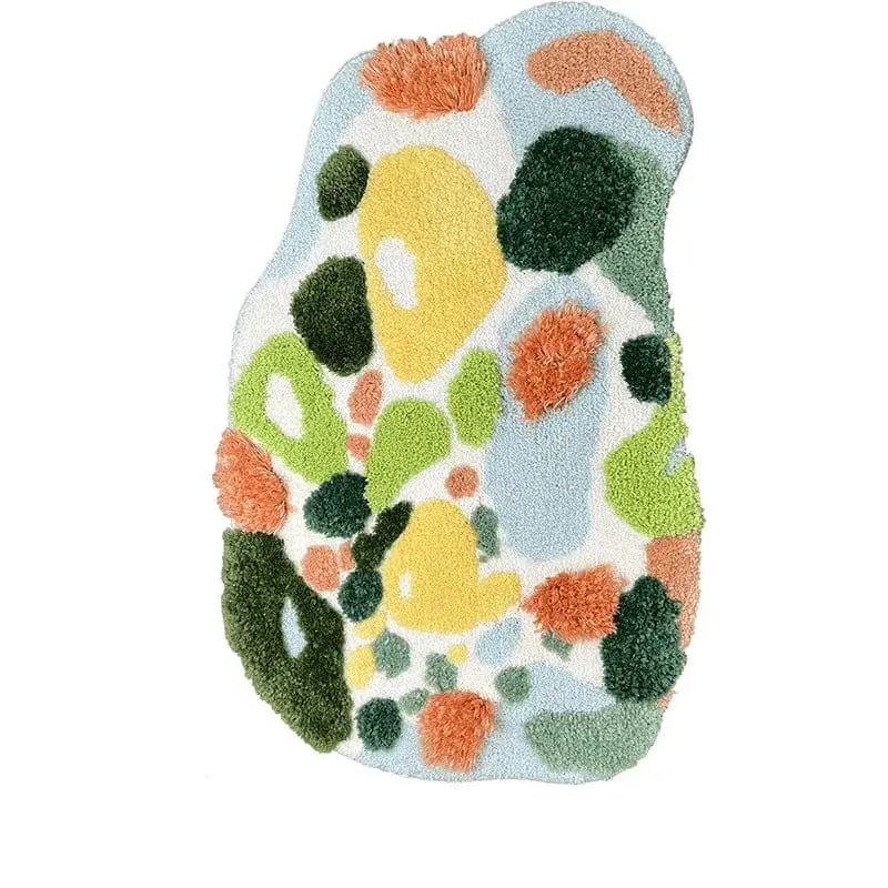 Farbenfroher Badteppich mit abstraktem Muster und weichem Velours-Design.