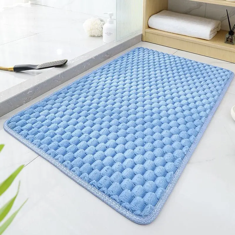 Blauer runder Badteppich mit strukturiertem Muster, ideal für Badezimmer und Dusche.