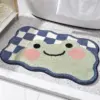 Badteppich mit Schachbrettmuster und Froschmotiv, ideal für Badezimmer.