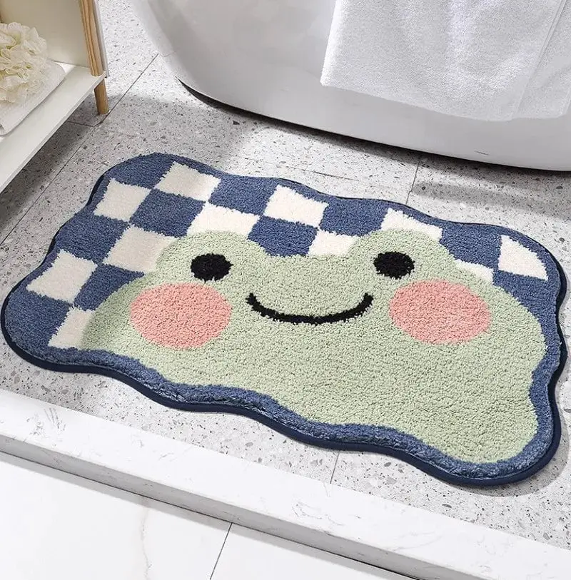 Badteppich mit Schachbrettmuster und Froschmotiv, ideal für Badezimmer.