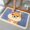 Badteppich mit Shiba Inu Motiv, weiches Material, blau-creme Farbe, ideal für Badezimmer.