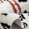 Badteppich Tigermuster, weiss schwarz orange, flauschig, Badezimmer-Textil.