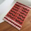 Badteppich mit Tigermuster in Orange und Schwarz, rutschfest, für Badezimmer.