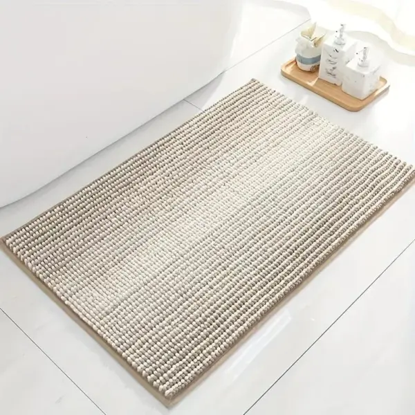 Weicher Chenille-Badteppich in Beige, ideal für Badezimmer, rutschfest und pflegeleicht.