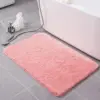 Pink Badezimmerteppich mit weicher Textur, ideal für Badematte und Badezimmer.