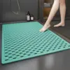 Rutschfeste Duschmatte in Türkis mit Drainage, ideal für Badezimmer und Dusche.