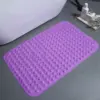Lila rutschfester Duschvorleger mit runden Strukturen, ideal für Bad und Dusche.