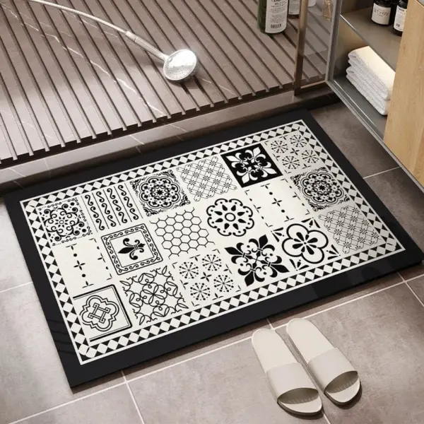 Vinyl Badteppich mit schwarz-weißem Mosaikmuster, rutschfest und pflegeleicht für moderne Bäder.